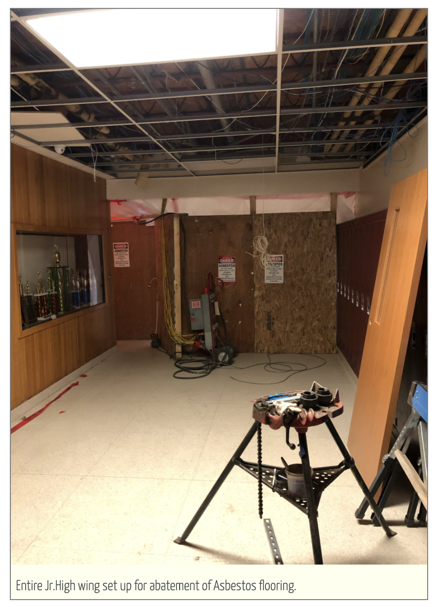 Entire jr./sr. high wing set up for abatement of asbestos flooring.